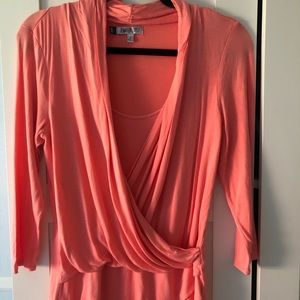 Jennifer Lopez lightweight peachy orange top